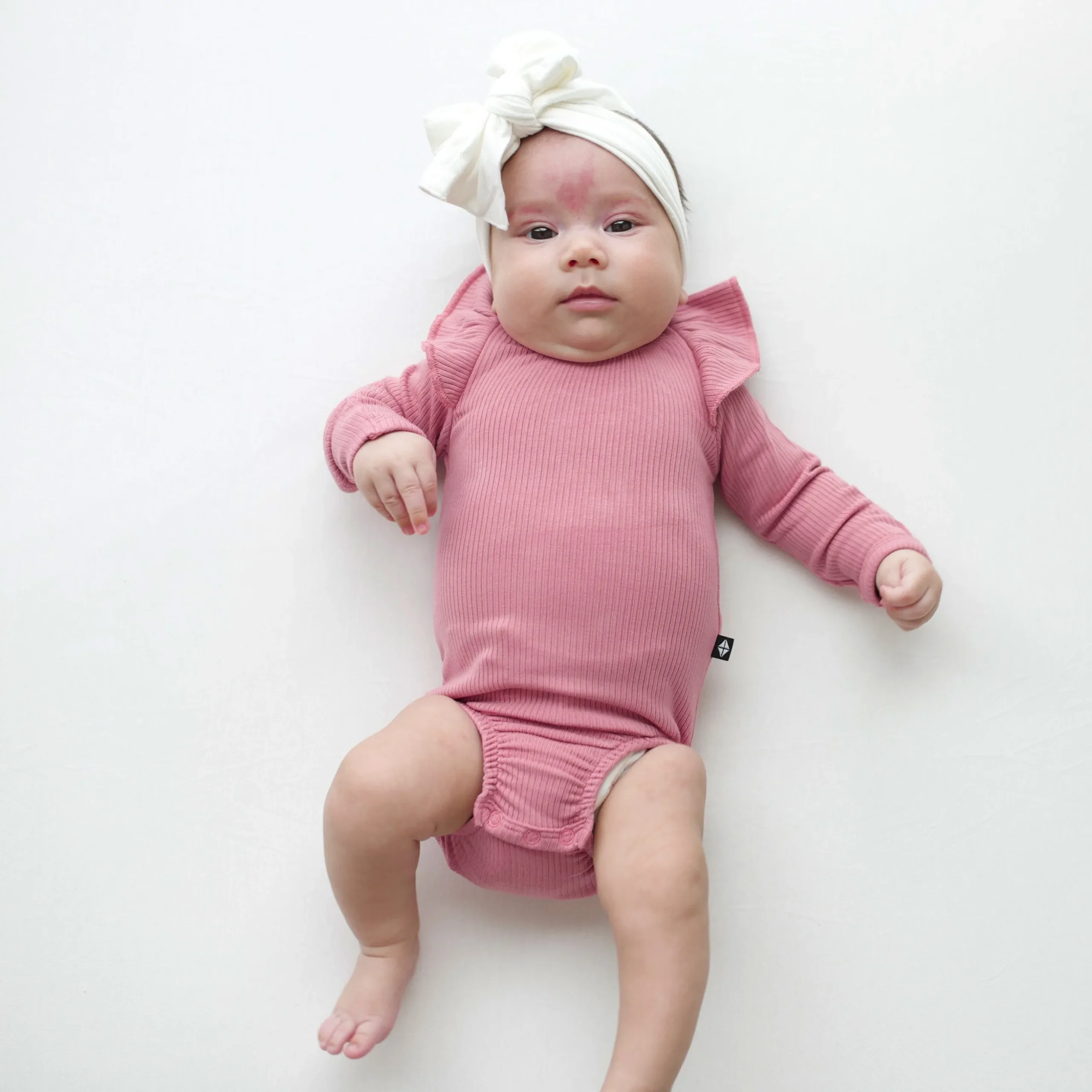 Ribbed Long Sleeve Ruffle Leotard in Apple Blossom
