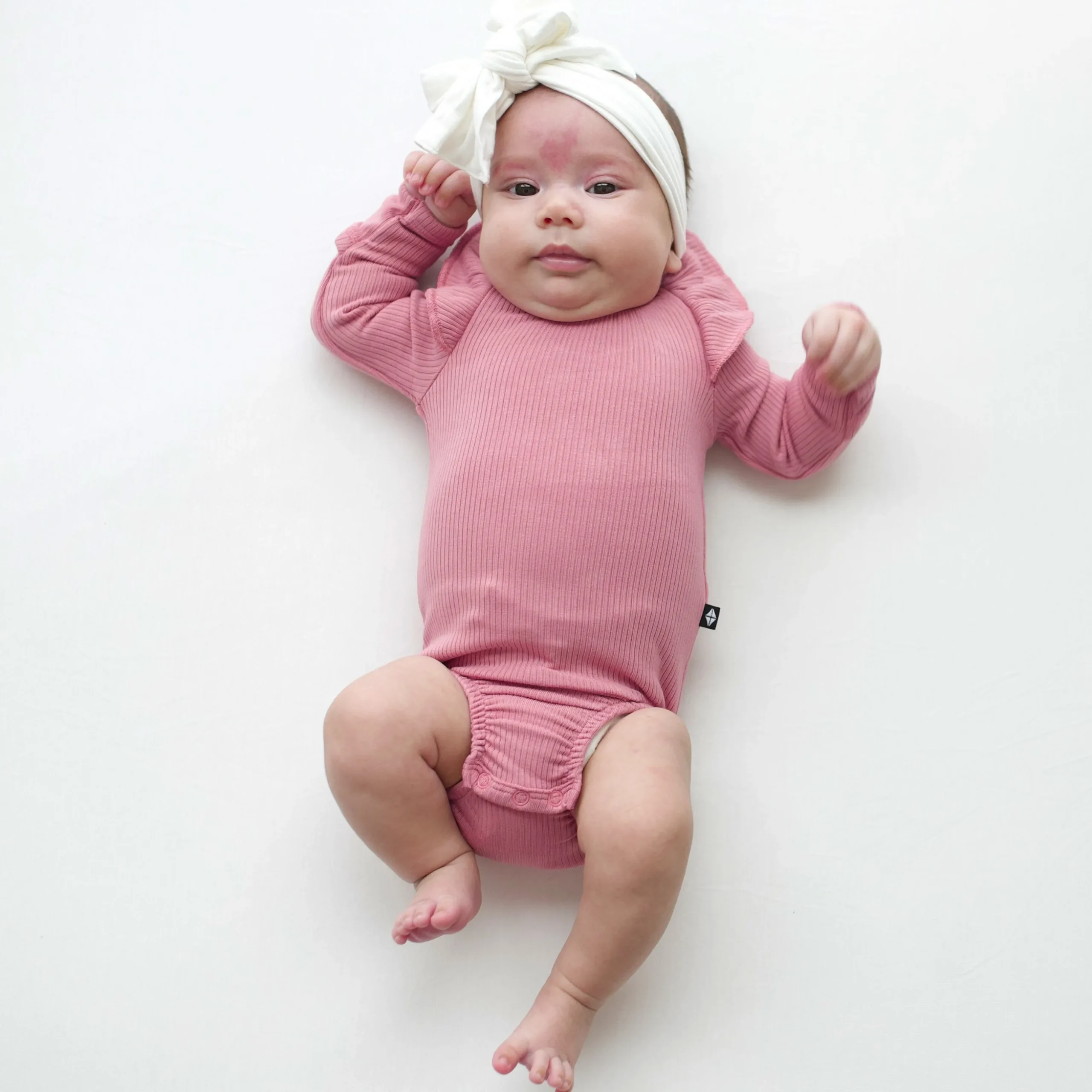 Ribbed Long Sleeve Ruffle Leotard in Apple Blossom