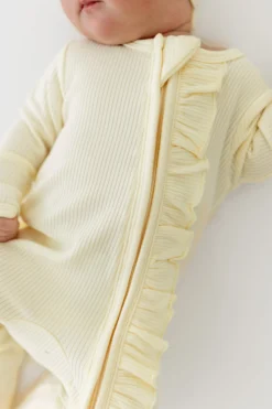 Ribbed Ruffle Zipper Footie in Chamomile