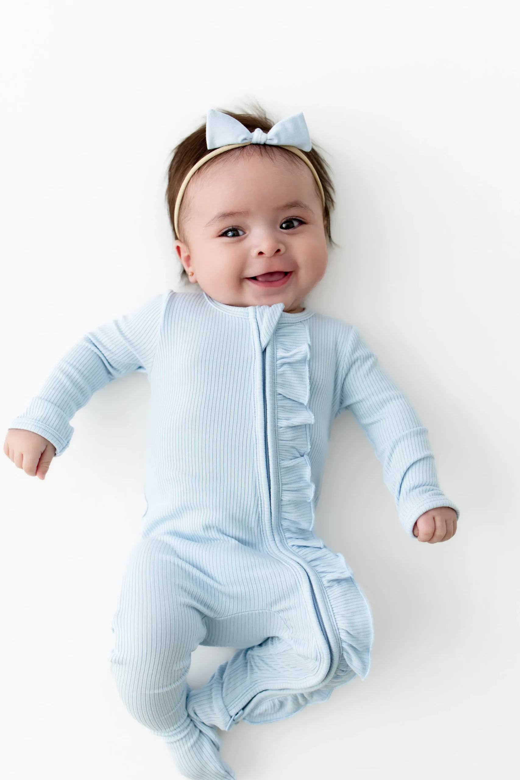 Ribbed Ruffle Zipper Footie in Breeze