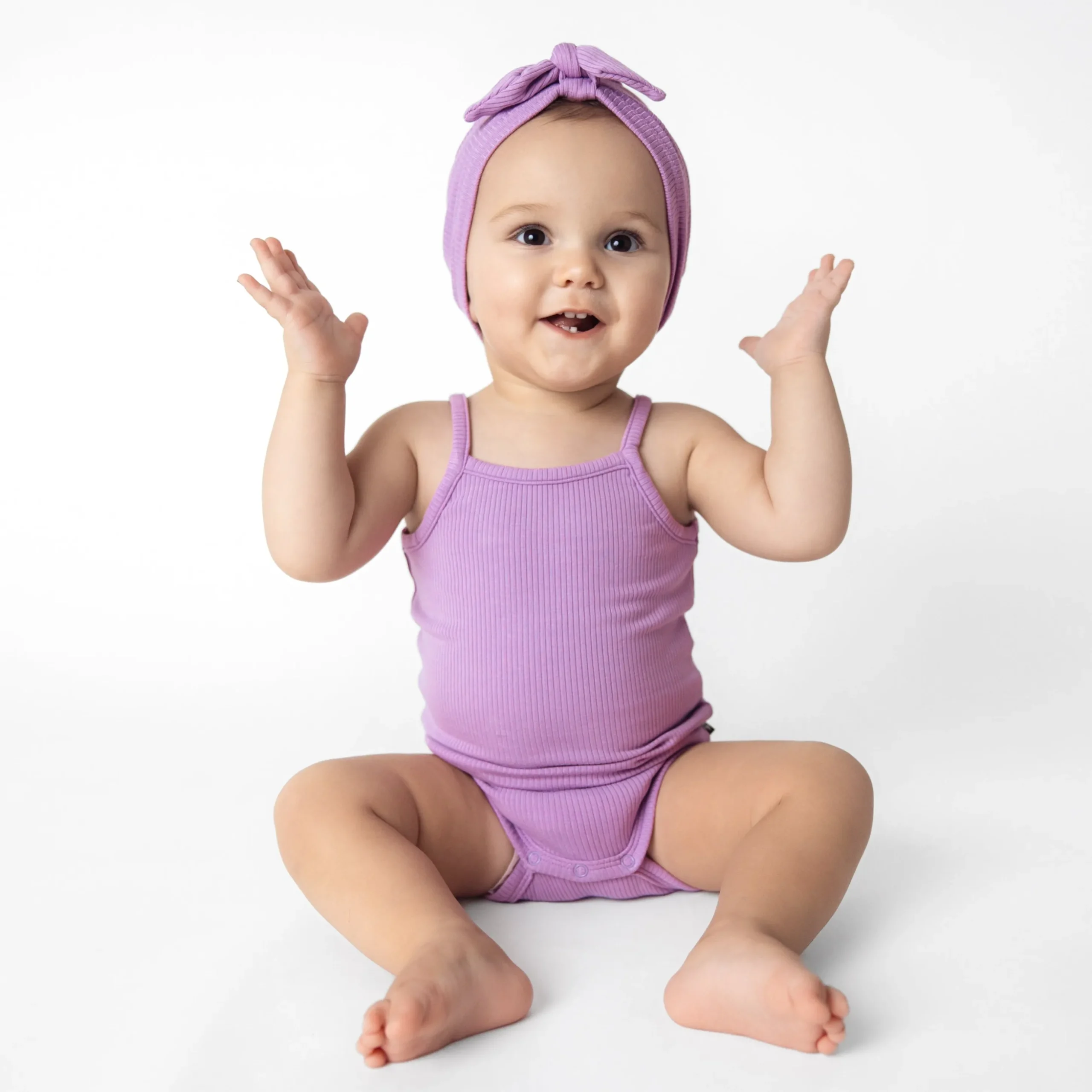 Ribbed Spaghetti Strap Bodysuit in Poi