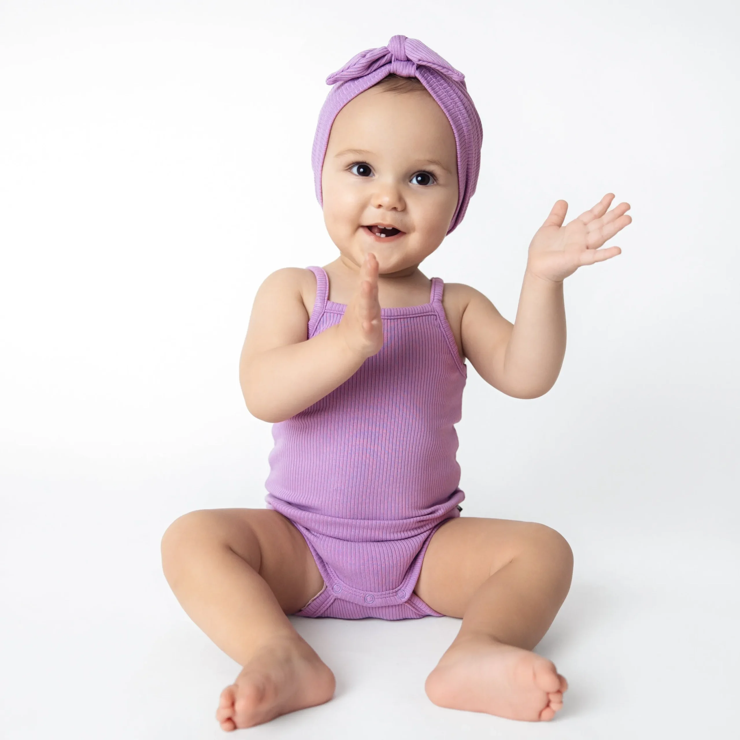 Ribbed Spaghetti Strap Bodysuit in Poi