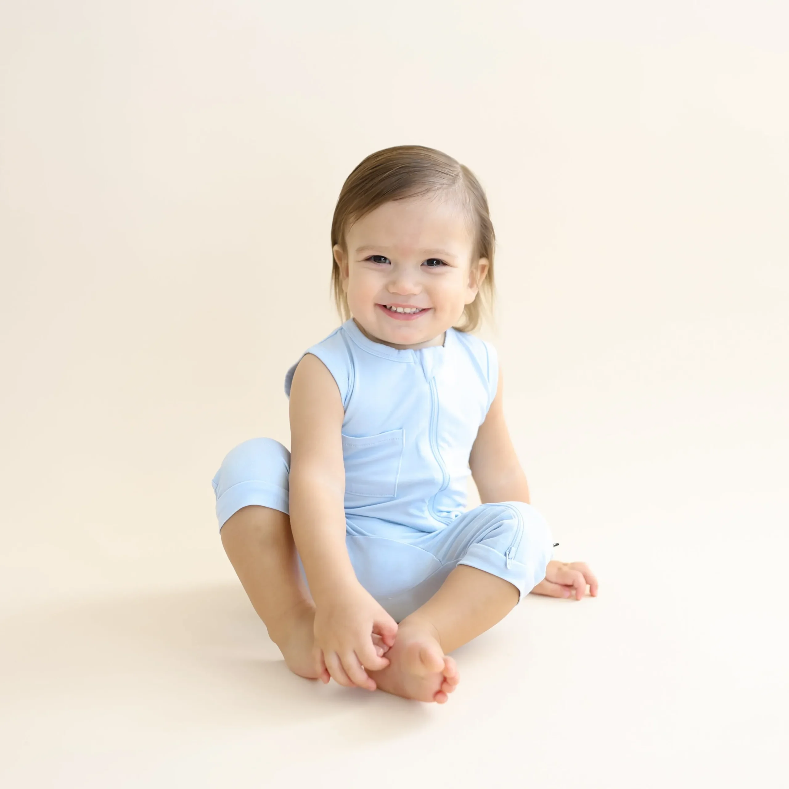Zippered Sleeveless Romper in Breeze